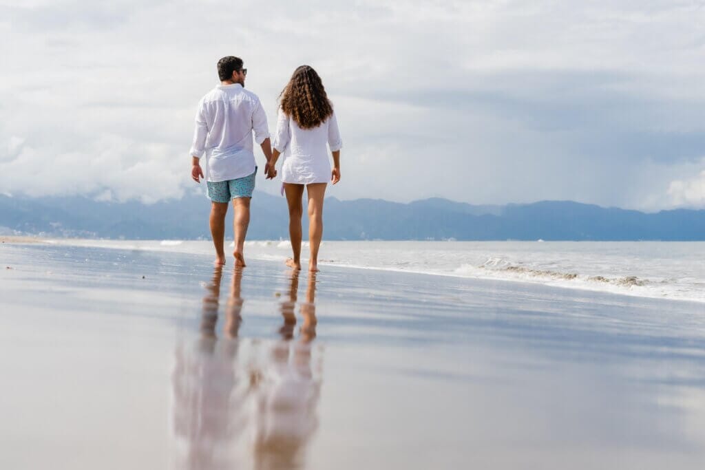 Palace Resorts Review Palace Resorts Review, couple walking on beach
